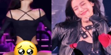 زي جيني الفاضح خلال أداء بريتي يكشف الكثير من جسمها